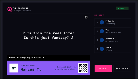 Qaoki's projected DJ screen with synced lyrics, the live queue, and cheers